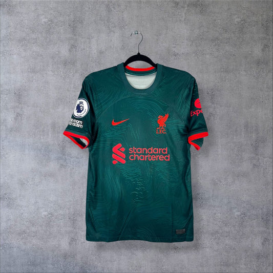Maillot Liverpool 2022-2023 Third, face avec logo Nike et sponsor Standard Chartered