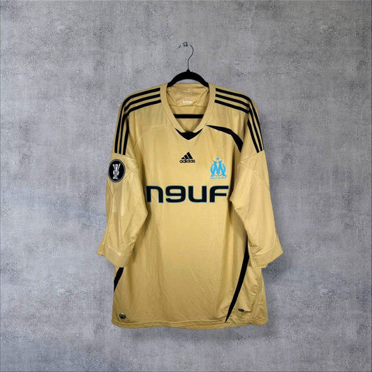 Face du maillot OM 2008-2009 third doré adidas avec sponsor n9uf et patch Coupe UEFA