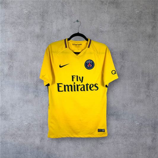Vue de face du maillot PSG jaune 2017 hommage Brésil avec sponsor Fly Emirates.