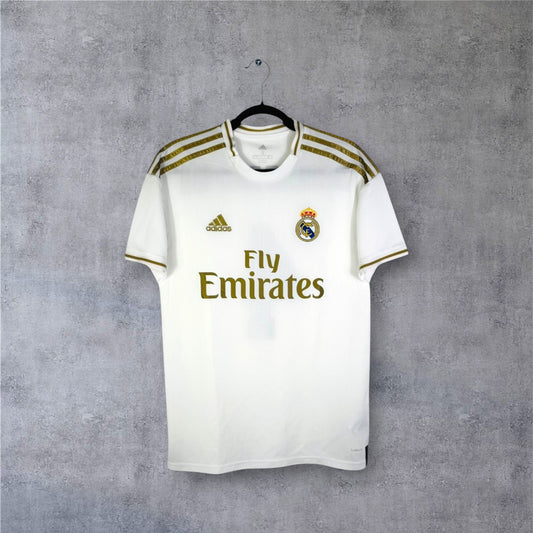 Maillot Real Madrid 2019-20 domicile blanc et or Adidas authentique vue de face.