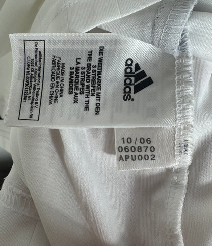 Étiquette interne de production Adidas code 060870 certifiant l'authenticité du maillot.