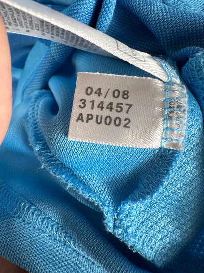 Étiquette interne Adidas code 314457 certifiant l'authenticité du maillot de Mamadou Niang, taille M.