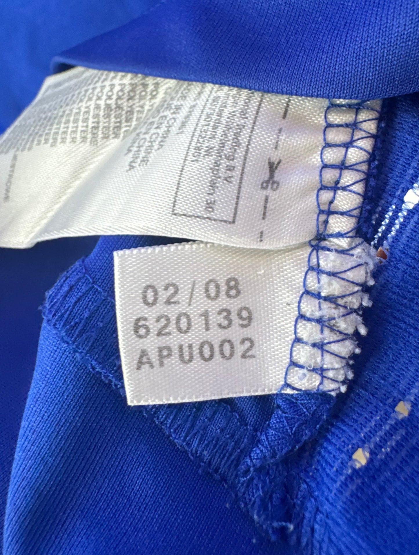 Étiquette interne de production Adidas code 620139 certifiant l'authenticité du maillot.