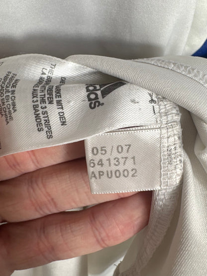 Étiquette interne Adidas code 641371 certifiant l'authenticité du maillot Drogba.