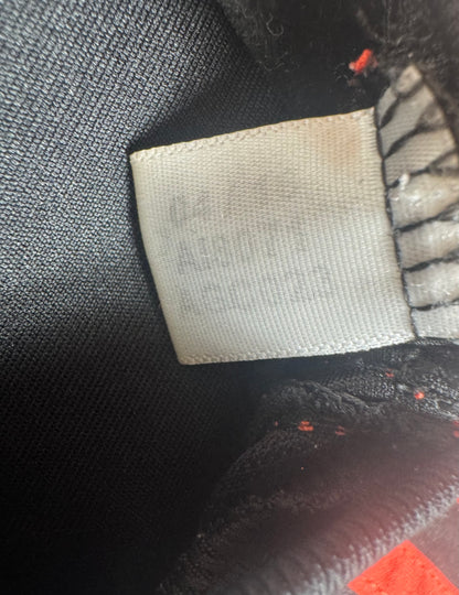 Étiquette interne Adidas avec code AI8071 prouvant l'authenticité du maillot Benfica.