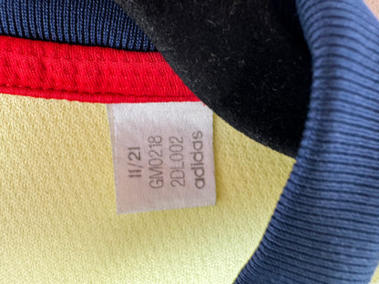 Étiquette interne Adidas code GM0218 certifiant l'authenticité du maillot de Gabriel Martinelli, taille S.