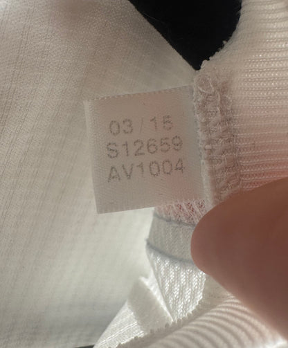 Étiquette interne Adidas avec code d'authenticité S12659 pour authentification du maillot Real Madrid.