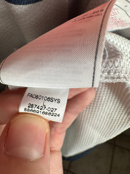 Étiquette interne Nike code 287427-027 certifiant l'authenticité du maillot de Guillaume Hoarau.