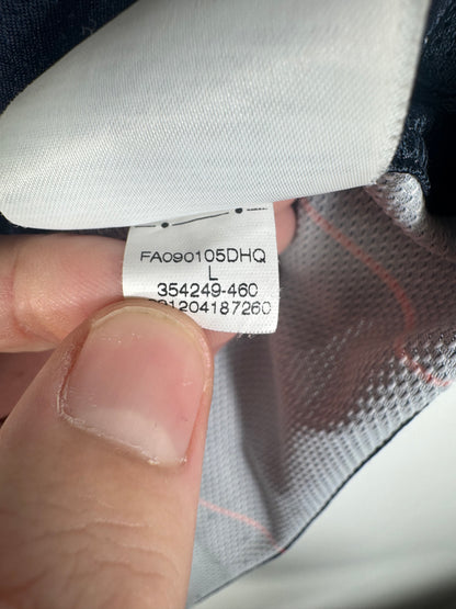 Étiquette interne Nike code 354249-460 certifiant l'authenticité du maillot de Ludovic Giuly.