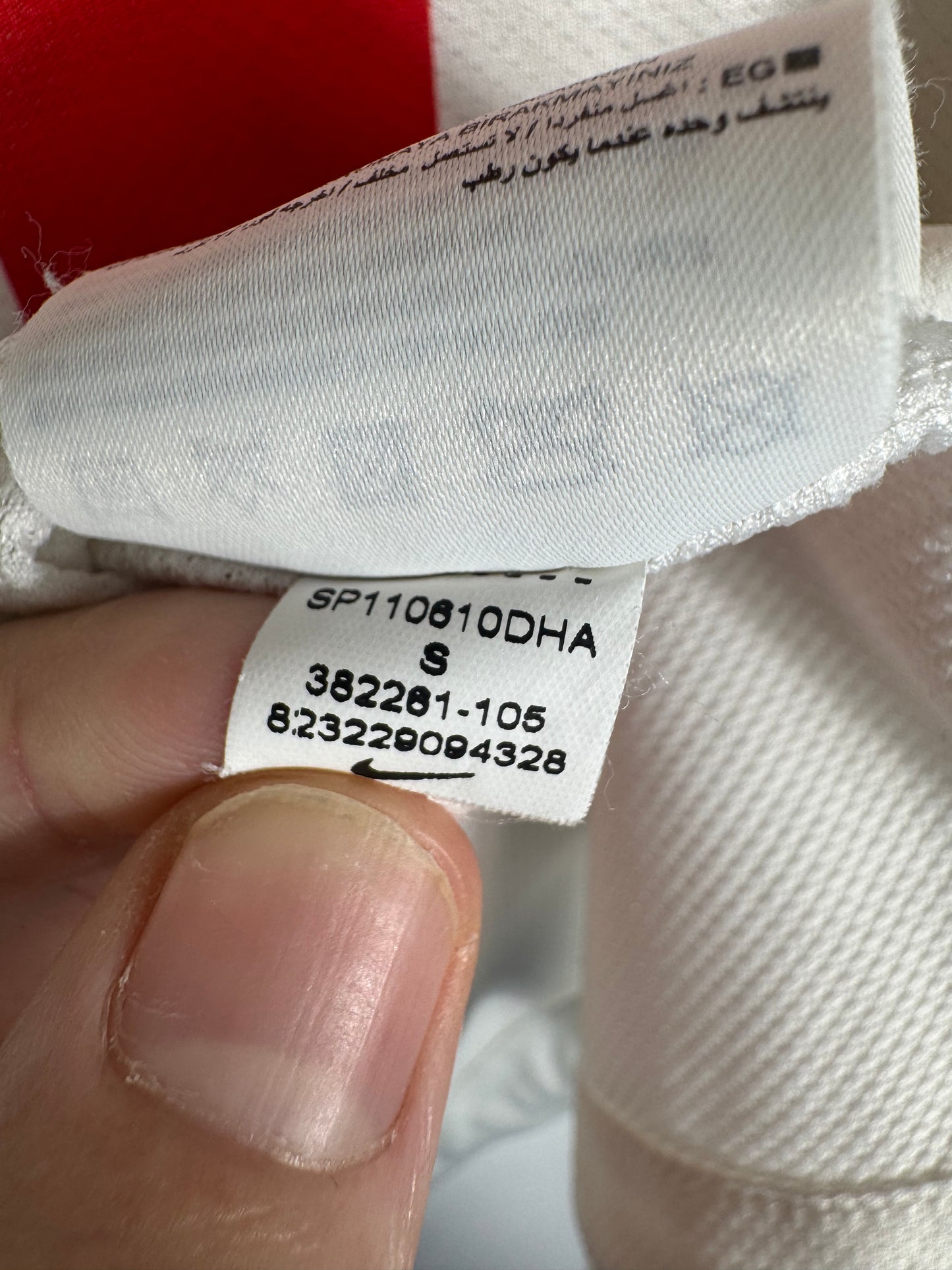 Étiquette interne Nike code 382261-105 certifiant l'authenticité du maillot.