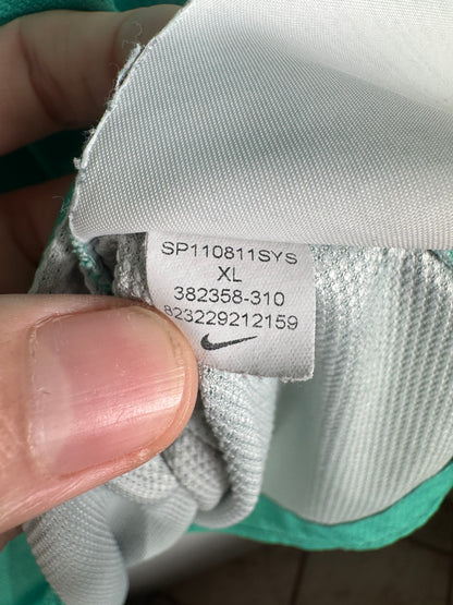 Étiquette interne Nike code 382358-310 certifiant l'authenticité du maillot, avec mention de la taille XL.
