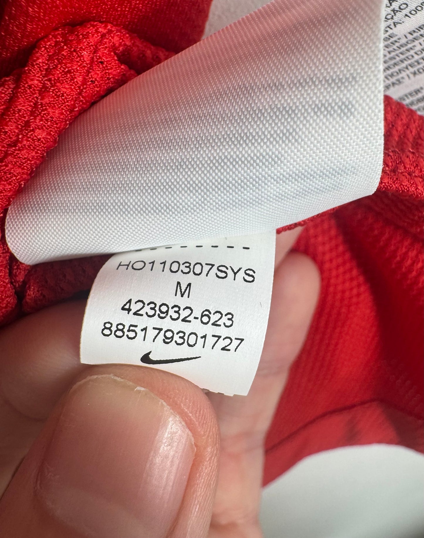 Étiquette interne Nike code 423932-623 certifiant l'authenticité du maillot Berbatov.