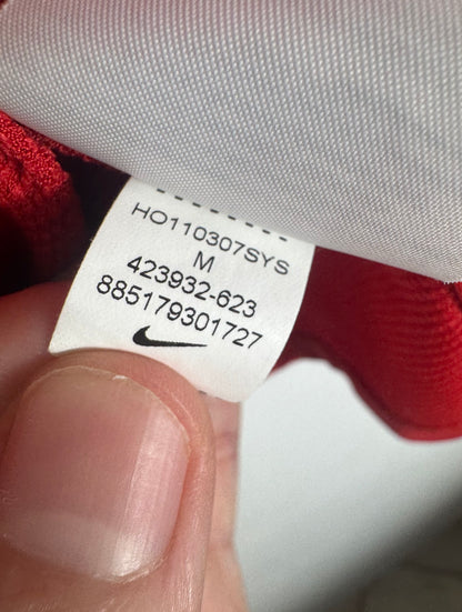 Étiquette interne Nike avec code 423932-623 certifiant l'authenticité du maillot Man Utd.