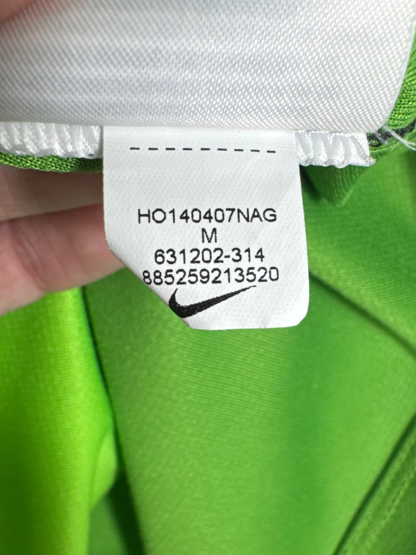 Étiquette interne Nike code 631202-314 certifiant l'authenticité du maillot Pogba.