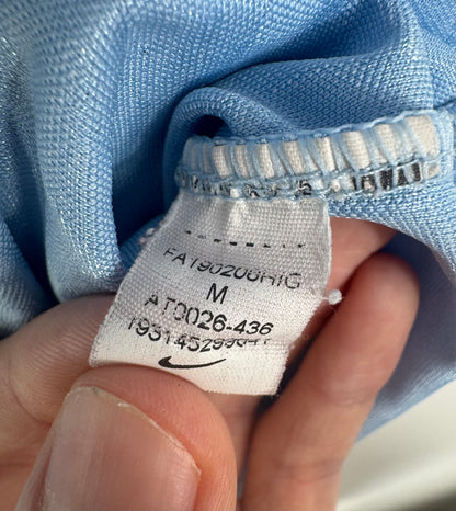 Étiquette interne Nike code AT0026-436 certifiant l'authenticité du maillot Félix.