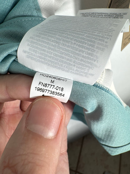 Étiquette interne Nike code FN8777-018 certifiant l'authenticité du maillot de Julián Álvarez.