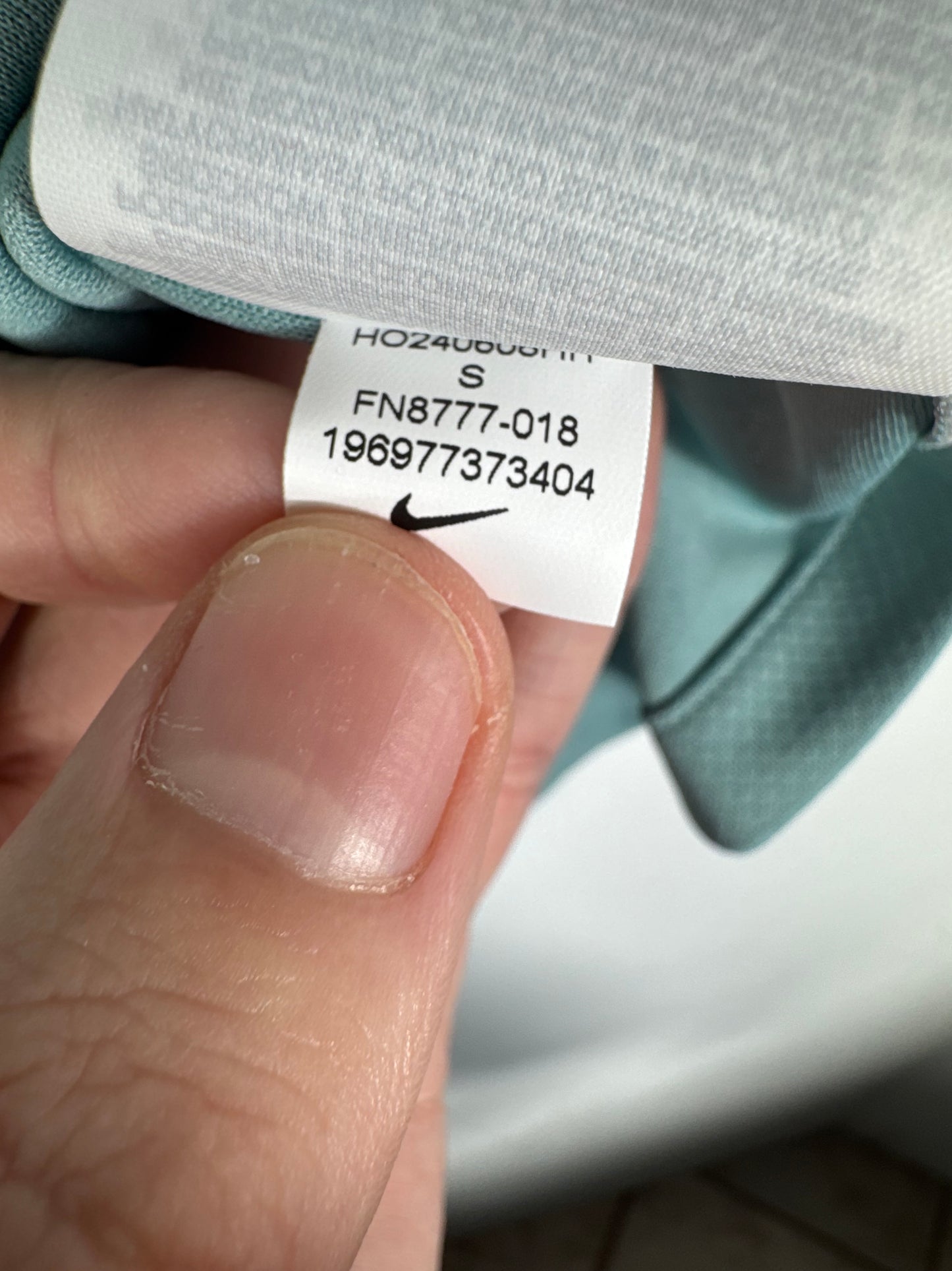 Étiquette interne Nike code FN8777-018 certifiant l'authenticité du maillot de Julián Álvarez.