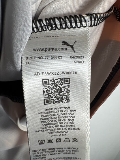 Étiquette interne Puma code 771344-03 certifiant l'authenticité du maillot d'Iliman Ndiaye.
