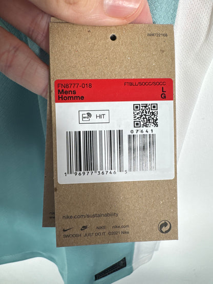 Zoom sur le tissu technique Nike Dri-FIT garantissant une respirabilité optimale.