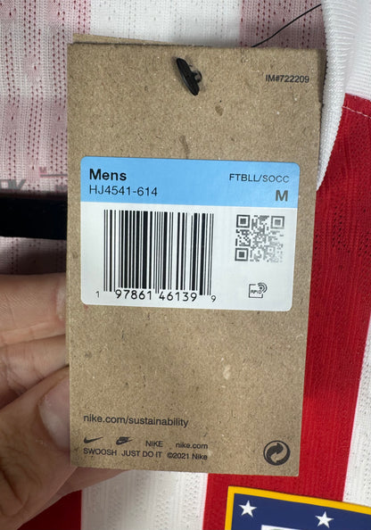 Étiquette Nike carton prouvant l'état neuf du maillot.