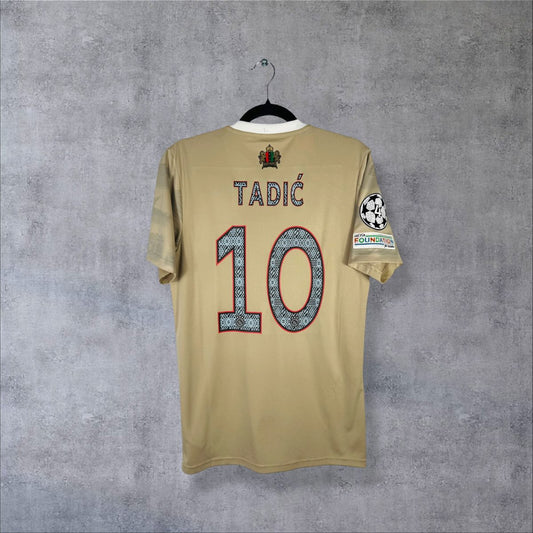 Maillot Ajax Amsterdam 2022-2023 third Daily Paper beige, dos floqué Tadić 10 et patchs Ligue des champions