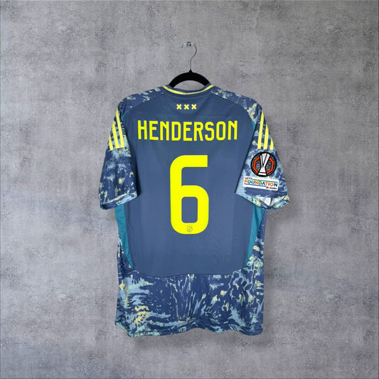 Dos du maillot Ajax Amsterdam 2024-2025 extérieur bleu avec flocage HENDERSON numéro 6 jaune fluo