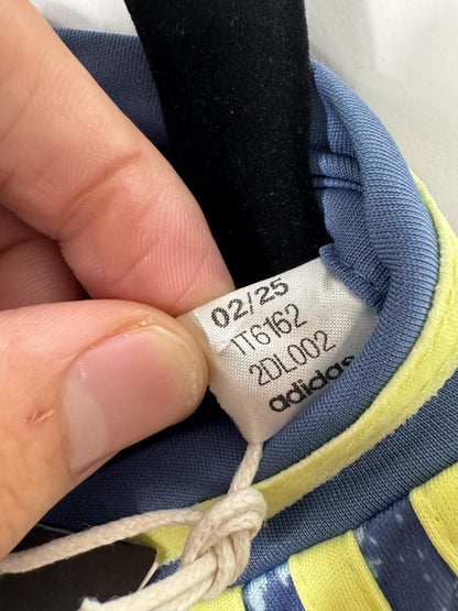 Étiquette intérieure du maillot Ajax 2024-2025 extérieur, référence IT6162 et date de production 02/25