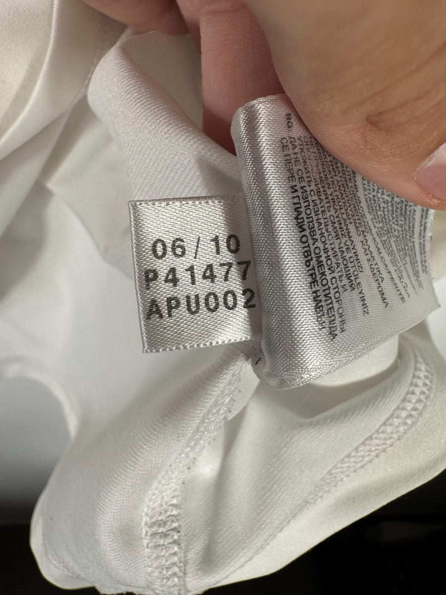 Étiquette intérieure adidas avec le code P41477 et la date 06/10 du maillot Allemagne 2010