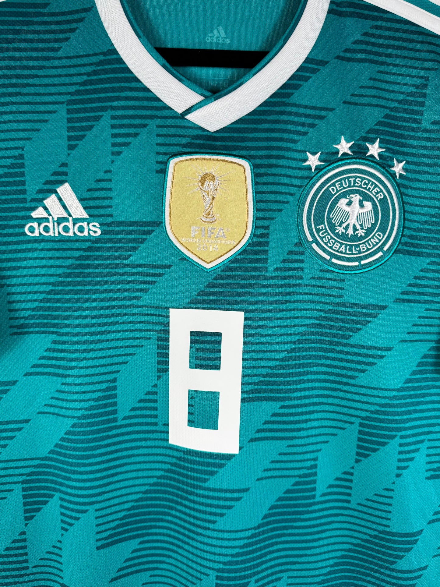 Détail de l'écusson de l'Allemagne et du logo Adidas
