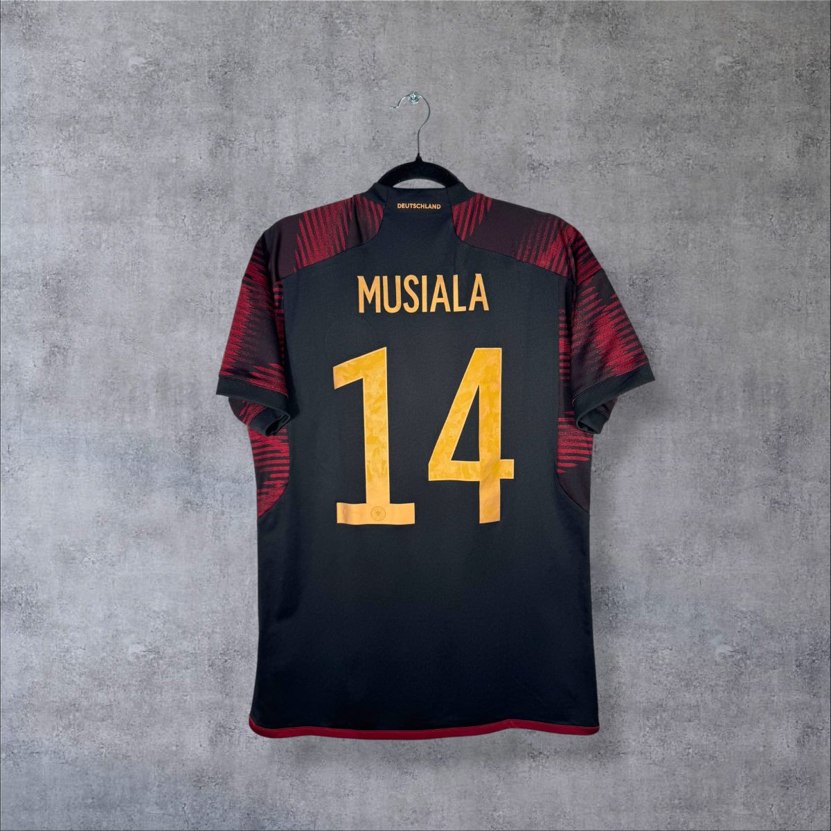 Maillot Allemagne Coupe du monde 2022 extérieur noir et rouge, dos floqué Musiala 14
