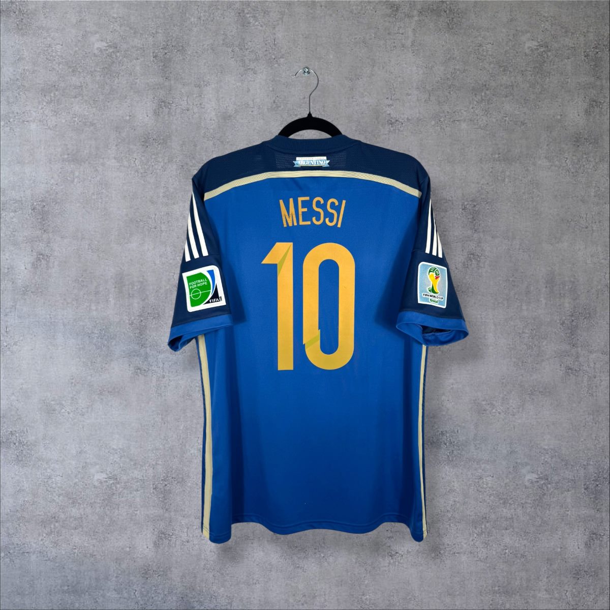 Dos du maillot Argentine extérieur 2014 Adidas bleu, flocage doré Messi 10