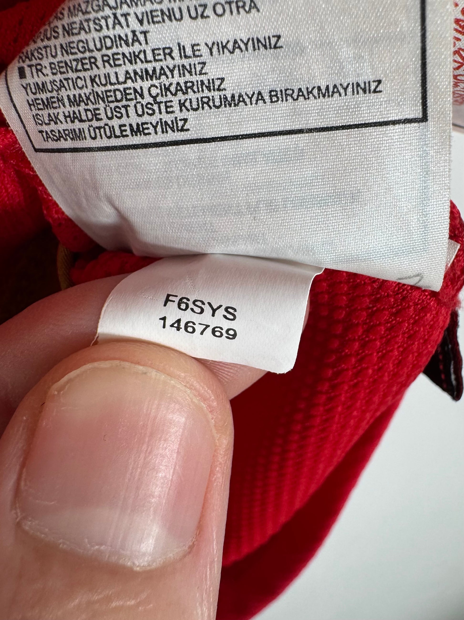 Étiquette d'authenticité avec code Nike 146769 prouvant l'originalité du maillot