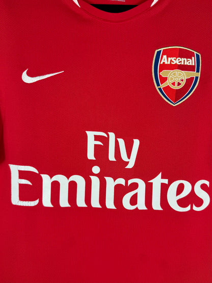 Détail de l'écusson d'Arsenal et du logo Nike
