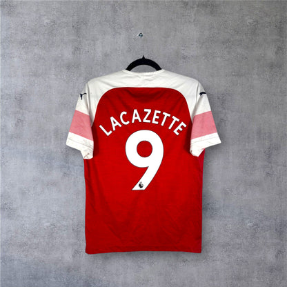 Flocage officiel blanc LACAZETTE numéro 9 au dos du maillot rouge Arsenal Puma.