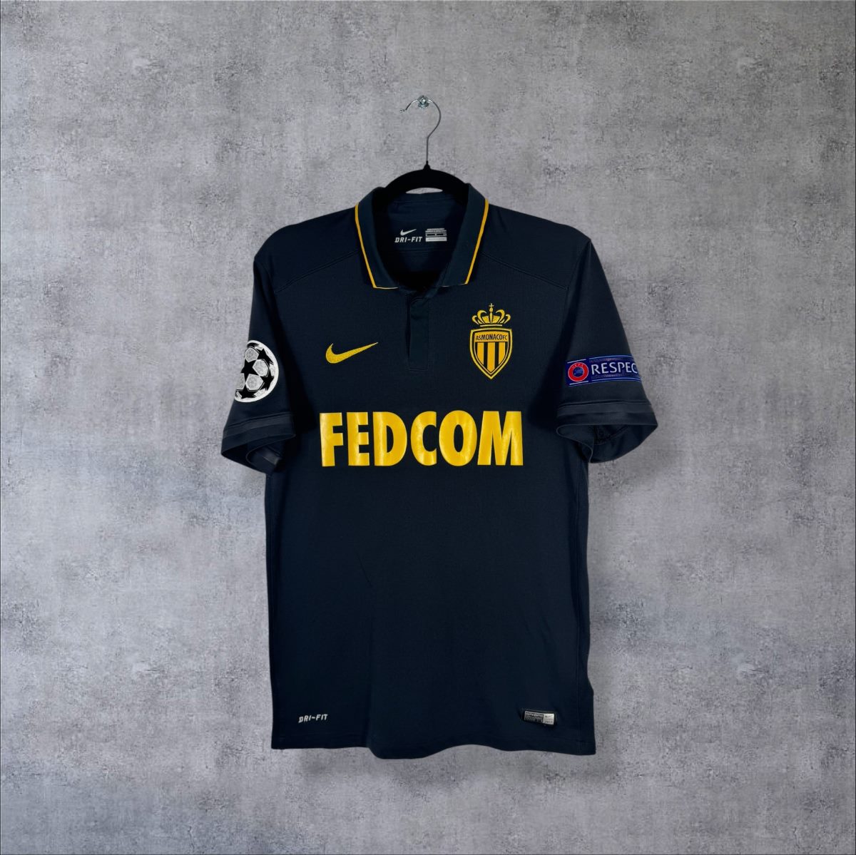 Face du maillot AS Monaco 2016-2017 third Nike bleu marine à col polo, sponsor FEDCOM