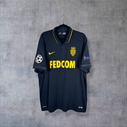 Face du maillot AS Monaco 2016-2017 third Nike bleu marine, sponsor Fedcom et écusson jaune