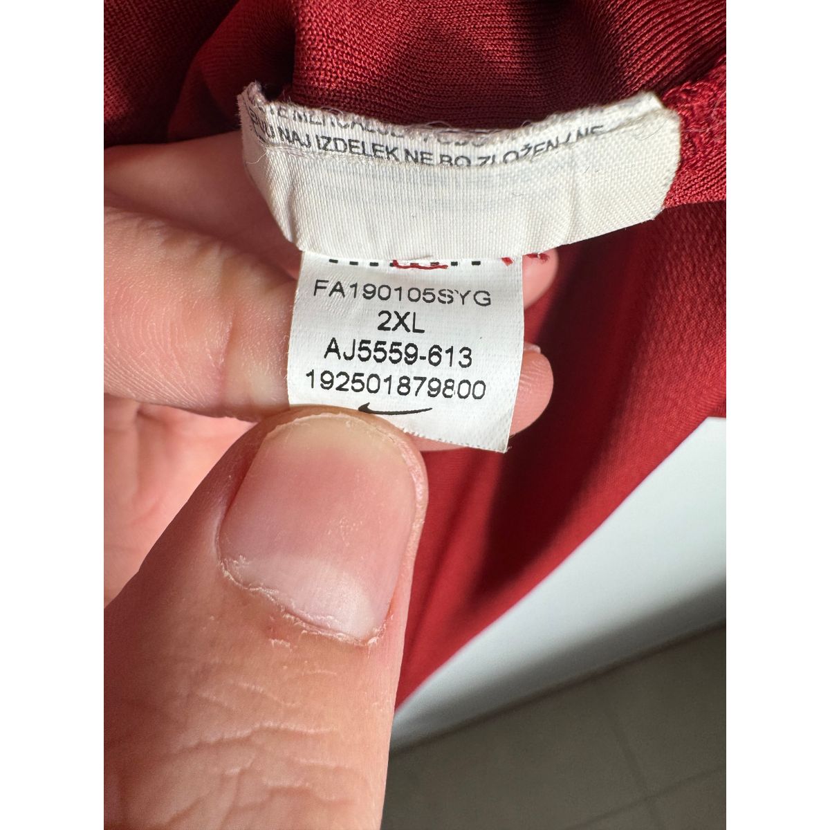 Étiquette d'authenticité avec code Nike AJ5559-613 prouvant l'originalité du maillot