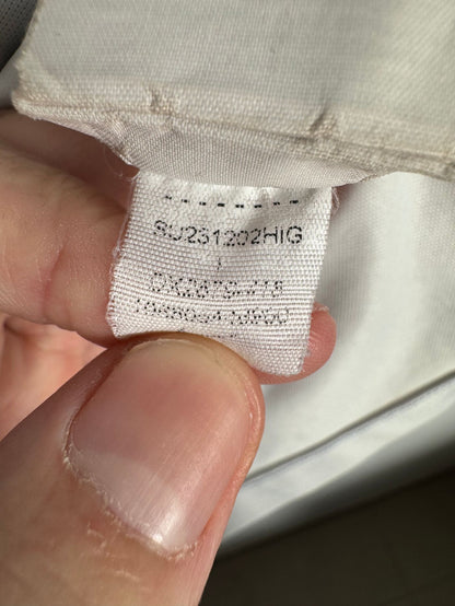 Étiquette d'authenticité avec code Nike DX2679-418 prouvant l'originalité du maillot