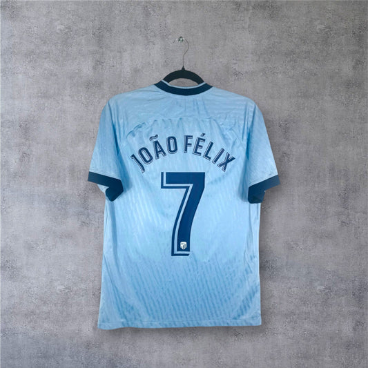 Flocage officiel blanc JOAO FELIX numéro 7 au dos du maillot bleu ciel Atletico.