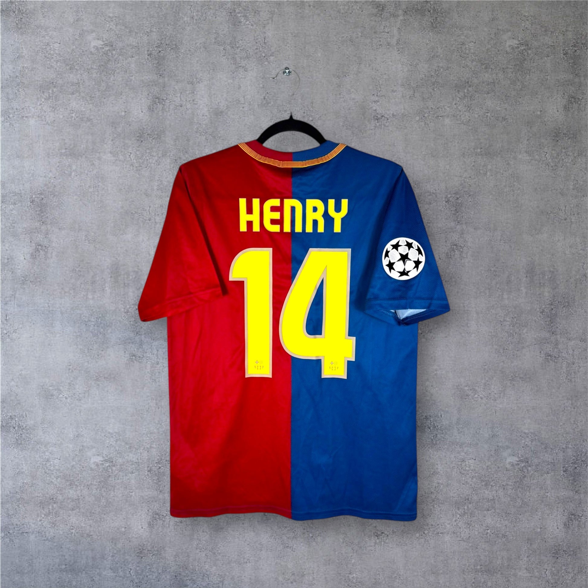 Dos du maillot FC Barcelone 2009 avec flocage jaune HENRY 14 et patch Ligue des Champions Starball.