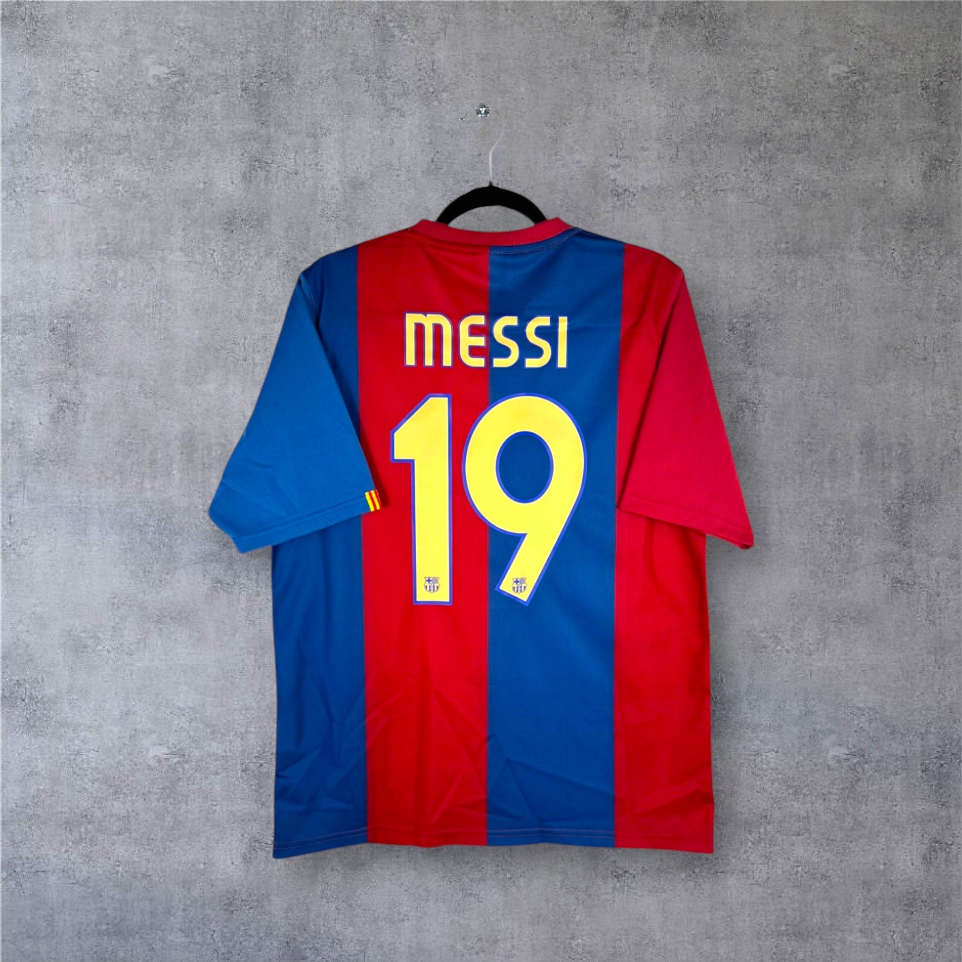 Dos du maillot FC Barcelone 2007 Blaugrana avec flocage jaune MESSI 19.