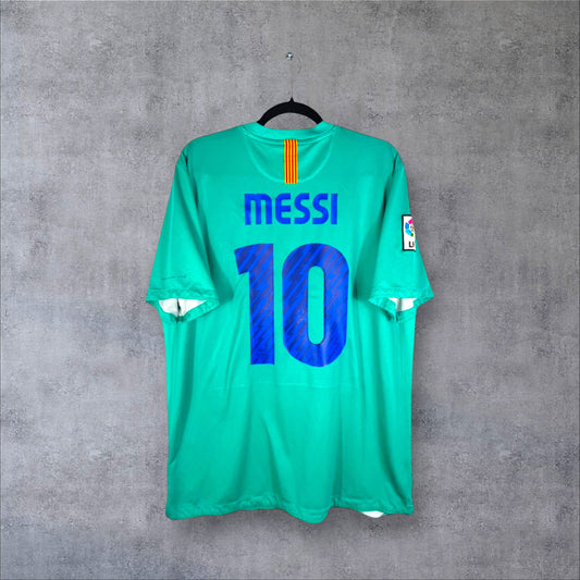 Dos du maillot FC Barcelone 2011 extérieur vert menthe avec flocage bleu MESSI 10 et patch LFP.