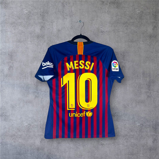 Flocage officiel jaune MESSI numéro 10 au dos du maillot coupe femme FC Barcelone.