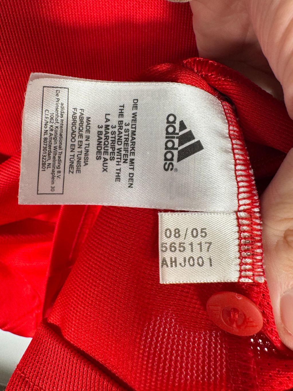 Étiquette d'authenticité avec code Adidas 565117 prouvant l'originalité du maillot