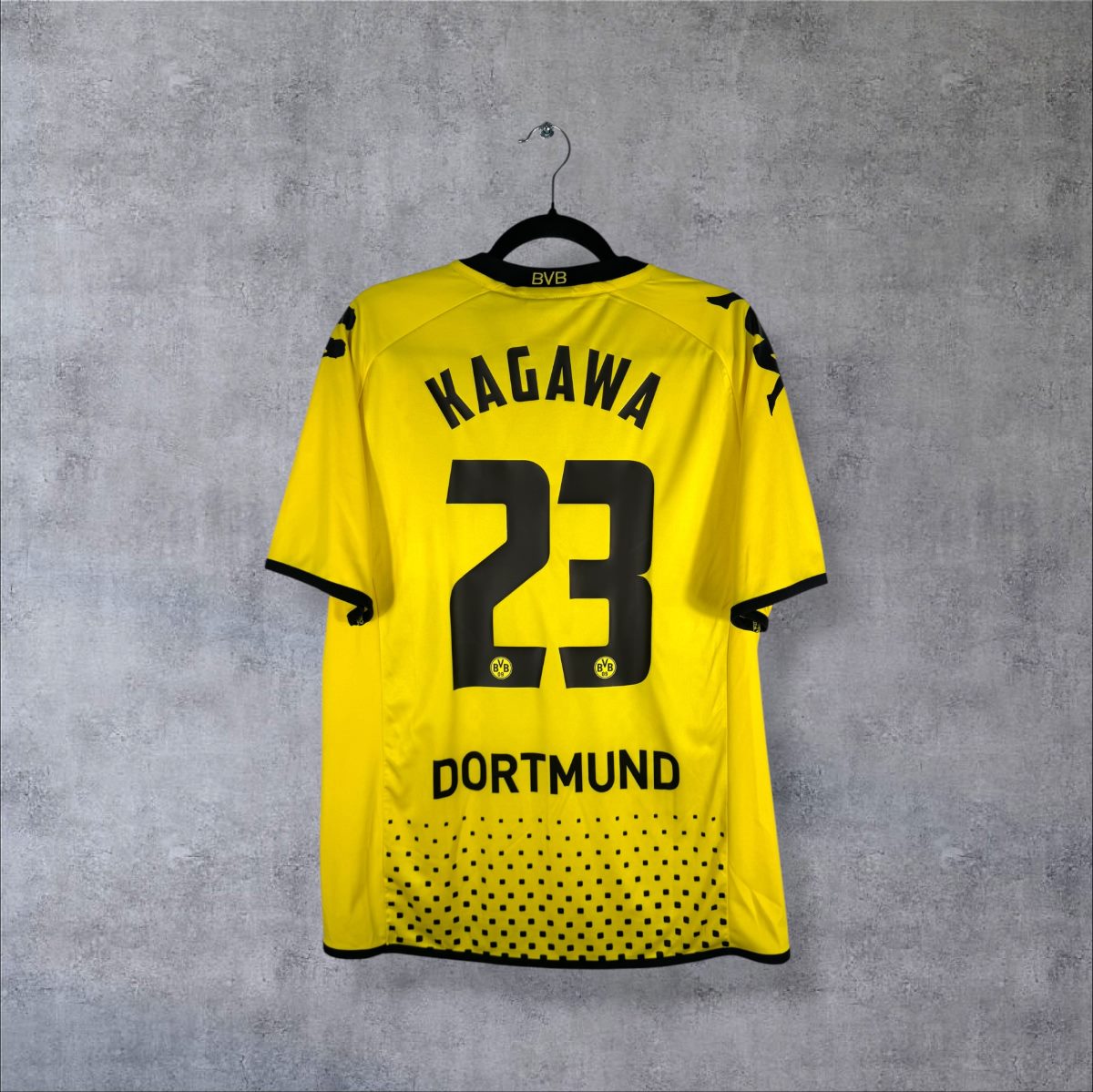 Dos du maillot Borussia Dortmund 2011-2012 domicile jaune avec flocage KAGAWA numéro 23 et bandeau DORTMUND