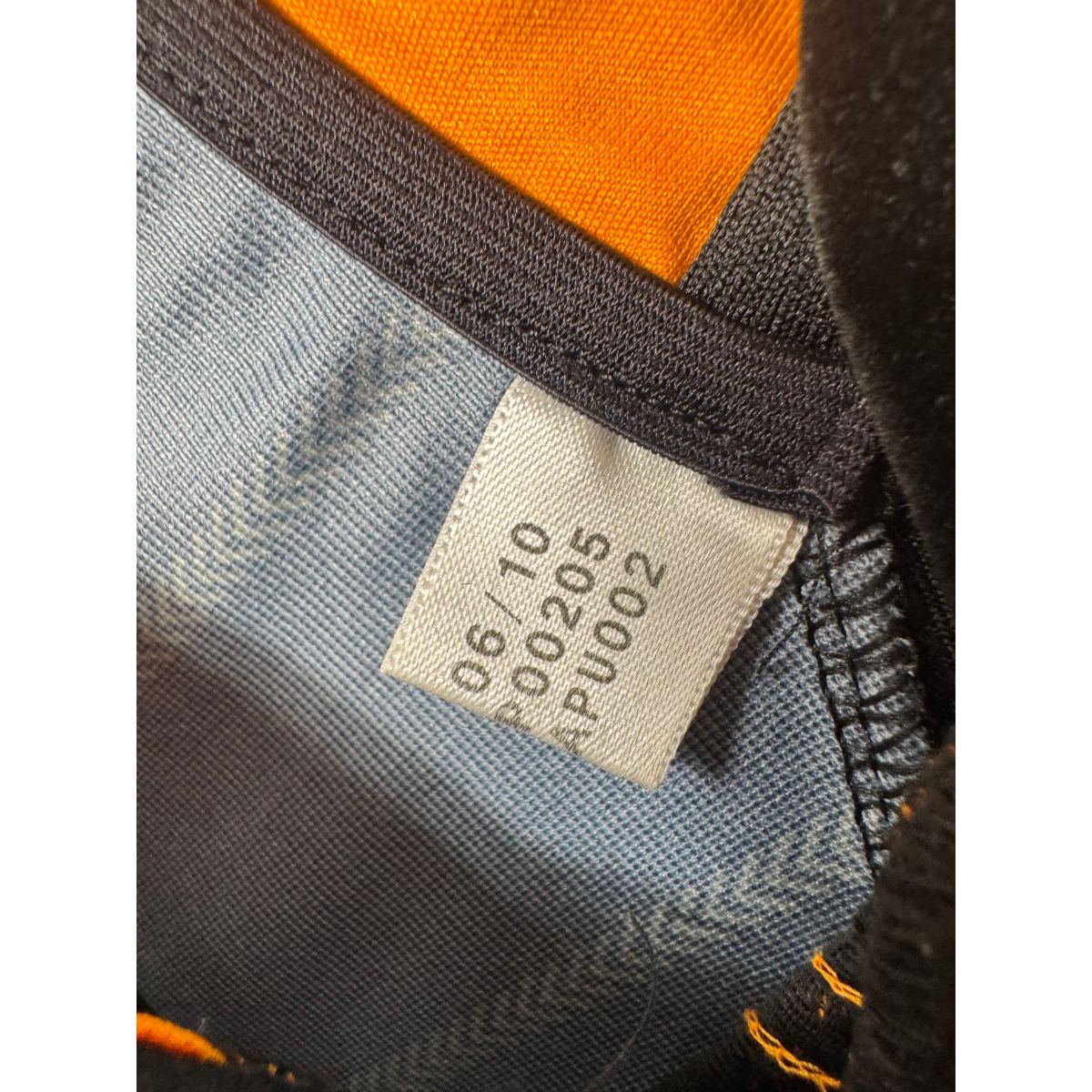 Étiquette d'authenticité avec code Adidas P00205 prouvant l'originalité du maillot