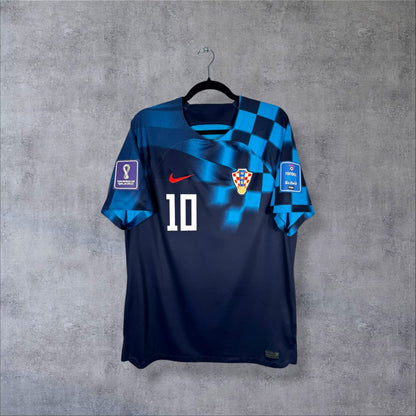 Face du maillot Croatie 2022-2023 extérieur Nike bleu marine avec motif damier et écusson HNS
