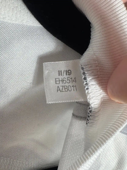 Étiquette intérieure d'authenticité avec code Adidas EH6514 prouvant l'originalité du maillot Espagne away Euro 2020 saison Pedri révélation