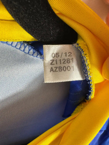 Étiquette intérieure d'authenticité avec code Adidas Z11281 prouvant l'originalité du maillot FC Bâle home Salah 2012-2013