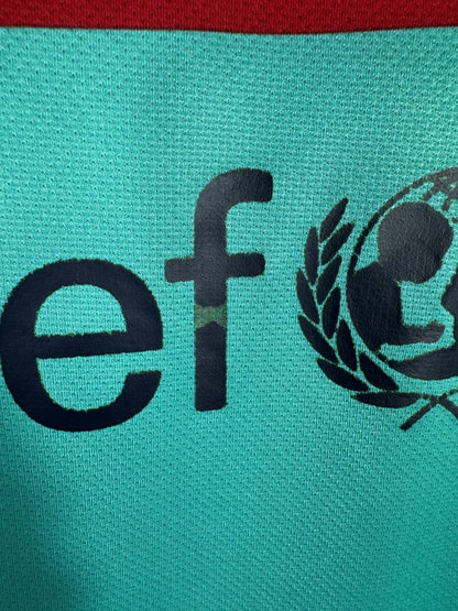 Micro usure du sponsor Unicef, maillot FC Barcelone extérieur 2010-2011